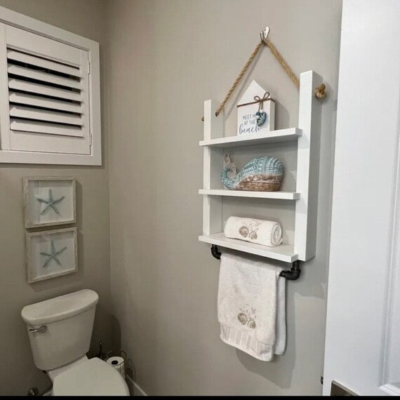 Bathroom decor above toilet deals