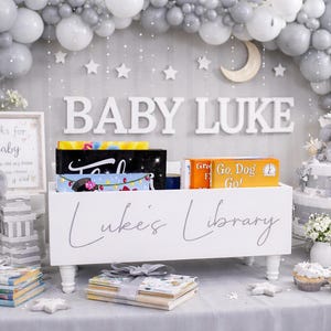 May include: A rustic wooden sign with the text "Welcome to our home" in white lettering. The sign features a distressed finish and a simple, inviting design, perfect for a front porch or entryway.