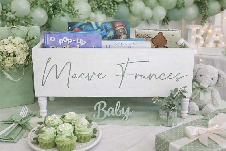 May include: A handmade wooden sign with the text "Welcome to our home" in a handwritten style. The sign is painted white with a distressed finish and features a decorative floral design. It is designed to be hung on a wall.