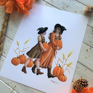 May include: Two witches in black hats and fall-themed outfits carry pumpkins in a field of wheat. The witches are wearing brown boots and have long brown hair. The pumpkins are orange and round. The background is a white canvas.