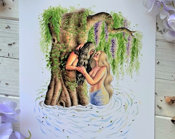 May include: Watercolor painting of two women embracing in a forest. One woman is a mermaid with long blonde hair and a blue tail. The other woman has long dark hair and is wearing a green dress. They are standing in a pool of water with a large tree behind them. The tree has green leaves and purple flowers.