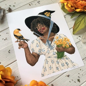 May include: A watercolor illustration of a woman wearing a witch's hat and a white dress with blue flowers. She is holding a bouquet of yellow flowers and a small yellow bird is perched on her finger.