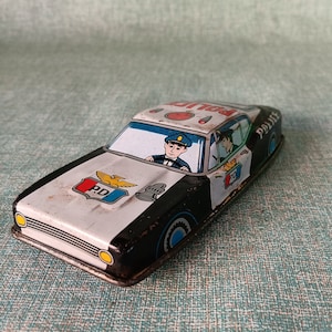 Vintage Japanese Tin Friction Police Car: 1960s-70s Toy