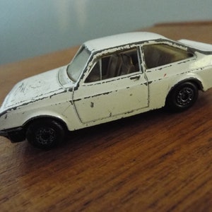 Vintage 1978 Matchbox Superfast Ford Escort RS2000 No. 9.  Fair condition.  White with tan interior.