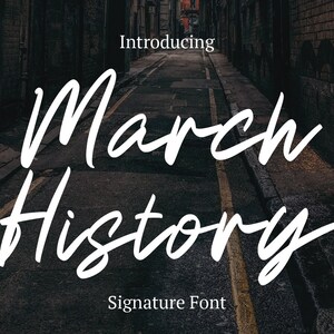 May include: Image features the words "Introducing March History Signature Font" in a white, cursive font. The text is set against a dark, blurred background of an alleyway.