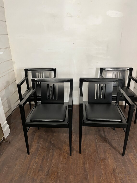 Set of four online black dining chairs