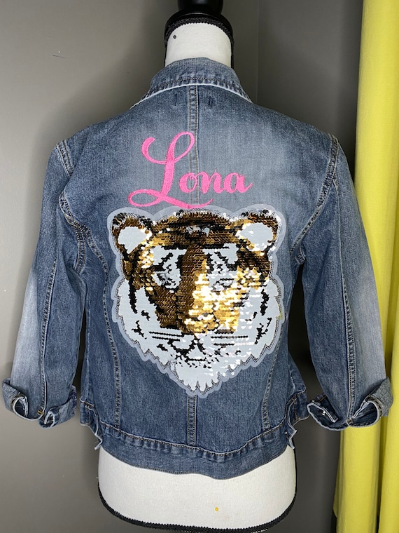 jeans with tiger patch