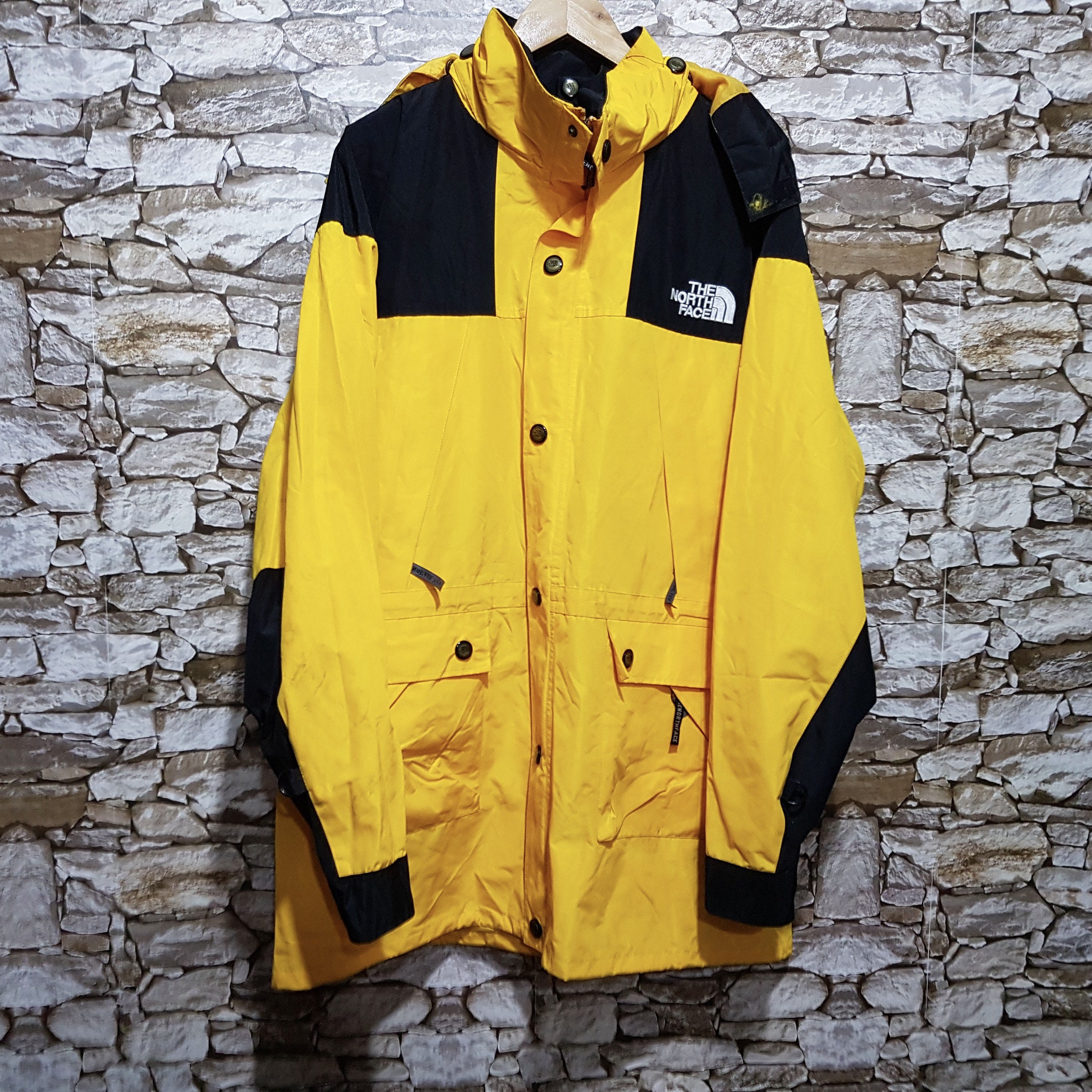 north face yellow windbreaker