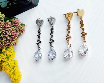 Love heart studs with amour word charm and shiny clear crystal pendant, edgy and glamourous dangle earrings for women, cool drop earrings