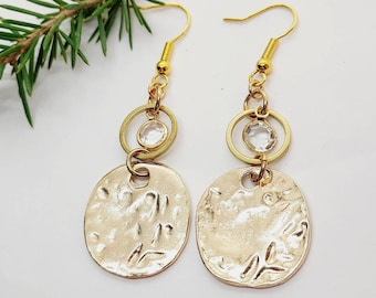 Hammered gold disk earrings with open circle and clear crystal charm, gold geometrical jewellery for women, long dangling shiny earrings