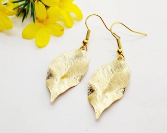 Dangle and drop earrings with shiny gold plated copper leaf charms, lightweight simple earrings with gold leaves, simplistic jewellery
