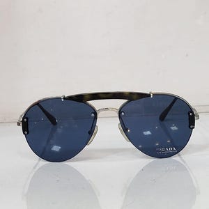 Classic & Cool – Designer Sunglasses for Men and Women Prada Blue Sunglasses