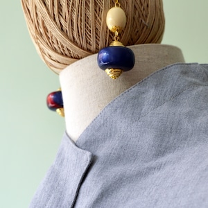 ANDON earrings with Italian resin pearls. Assembled by hand. Colours: cream, blue, red, with open golden hook