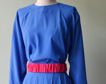 Light blue shirt Green blouse in pure silk crepe. Round neckline, slightly squared.  Button closure. Italian fabric