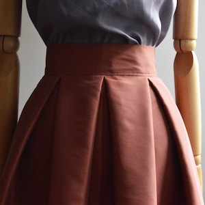 PORFIDO ROSSO pleated skirt for women in silk blend taffeta. Solid color terracotta, elegant skirt, ceremony skirt