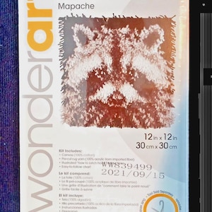 May include: A Wonderart latch hook kit featuring a raccoon design. The kit includes pre-cut rug yarn, a canvas, and an easy-to-follow chart. The finished rug will measure 12 inches by 12 inches.