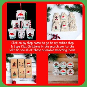 May include: A set of personalized Christmas-themed party favors. The favors include small burlap bags with gingerbread men and Santa hats, personalized cups with gingerbread men and Santa hats, and small jars with gingerbread men and Santa hats. The favors are all decorated with red and green colors.