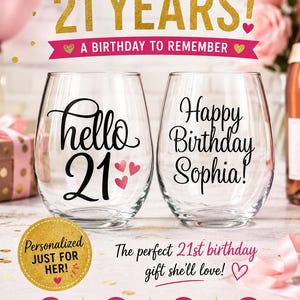 May include: Two stemless wine glasses with black script. One says "hello 21" with pink hearts, the other says "Happy Birthday Sophia!". The image has text that says "Cheers to 21 YEARS!" and "A Birthday to Remember".