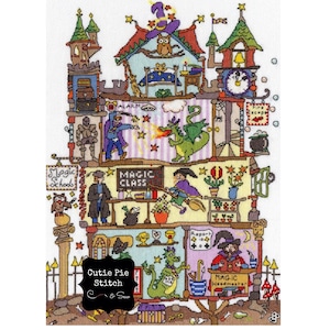 May include: A colorful cross-stitch pattern of a multi-level magic school building with a dragon, an owl, a witch, and a wizard. The text on the building reads "Magic School", "Magic Class", and "Magic Headmaster".