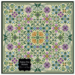 May include: A cross stitch pattern featuring a colorful floral design with a variety of flowers and leaves in shades of purple, blue, green, orange, and yellow. The pattern is framed by a green border and includes the text "Cutie Pie Stitch & Sew".