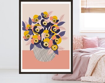 May include: A framed print of a floral arrangement with yellow, orange, and purple flowers in a woven basket against a pink background.