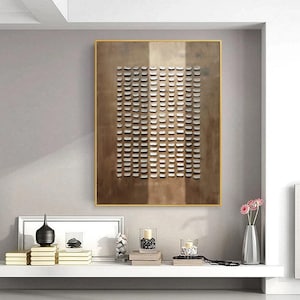 May include: A framed abstract art print with a geometric pattern of small white squares on a brown background.