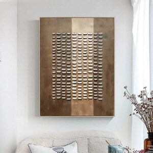 May include: Abstract wall art featuring a geometric pattern of white squares on a brown background. The squares are arranged in a grid pattern, creating a modern and minimalist design.