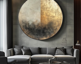 May include: A large circular wall art piece featuring a split design with a textured cream and white left side and a metallic gold leaf right side, both transitioning into a dark, charcoal-coloured abstract base with visible brushstroke textures.