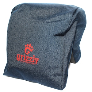 May include: A dark blue, rectangular, fabric pouch with a red paw print and the text "grizzly" in red. The text below "grizzly" reads "The Wild Grizzly.com".