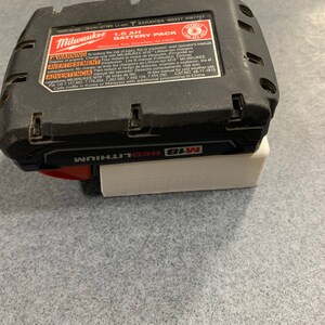 Milwaukee battery holder
