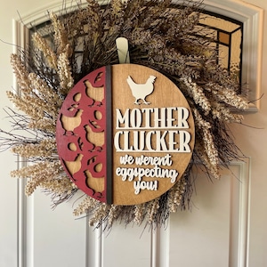 Mother clucker front door sign