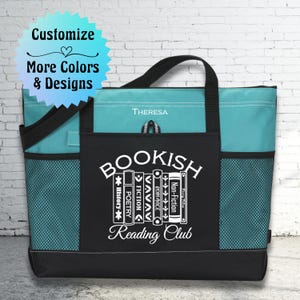 May include: A black and teal tote bag with a white design that says "BOOKISH Reading Club" with a stack of books that say "History", "Poetry", "Fiction", "Romance", "Non-Fiction" and "Fun Fiction".