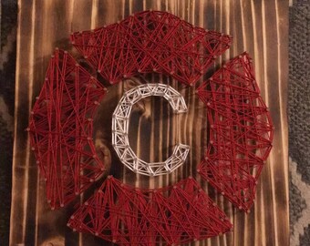 Cruz maltesa de fuego de madera