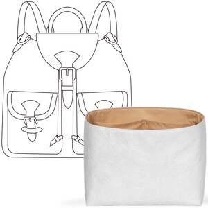 May include: A white backpack organiser with a beige interior is shown next to a line drawing of a backpack. The organiser has a textured surface and is designed to fit inside a backpack. The backpack has two front pockets and a top handle.