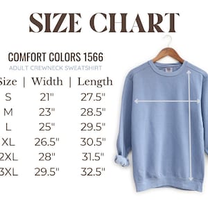 May include: Size chart for a Comfort Colors 1566 adult crewneck sweatshirt. The chart shows the width and length in inches for sizes S, M, L, XL, 2XL, and 3XL.