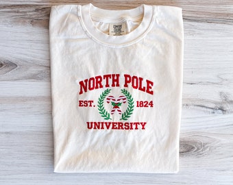 North Pole Comfort Colors Tee, Christmas Embroidered Shirt, Christmas T-Shirt, Winter Tee, Embroidered Shirt, Candy Canes Shirt, Holiday Tee