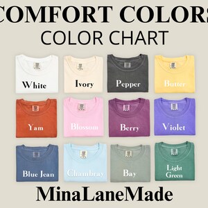 May include: Color chart showing 12 different colors of t-shirts. The colors are: White, Ivory, Pepper, Butter, Yam, Blossom, Berry, Violet, Blue Jean, Chambray, Bay, and Light Green. The text "COMFORT COLORS COLOR CHART" is at the top of the image. The text "Mina Lane Made" is at the bottom of the image.