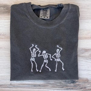 Skeleton Dancing Comfort Colors Tee, Pumpkin Tee, Halloween Tee, Fall T-Shirt, Spooky Season, Embroidered Tee, Embroidered Shirt, Spooky Tee