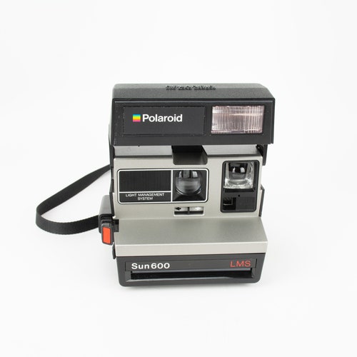 Polaroid Sun 600 LMS (Light Management System) Instant Camera-Fully shops functional- Film Tested- 30 Day Guarantee