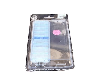 Flash GE Flip Flash II de 8 disparos vintage - Coleccionista de fotografía