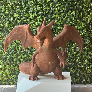 Rusted Charizard Statue