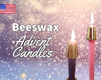 May include: Beeswax Advent Candles. The image shows two lit candles with gold-colored tops and a blurred background with a sparkling effect. One candle is purple, and the other is pink. The text "Beeswax Advent Candles" is displayed.