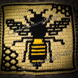 May include: A crocheted square featuring a black and yellow bee with a honeycomb design in the background. The text "Cydnie Birdsong Designs" is visible in the image.