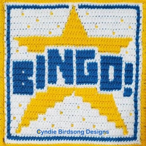 May include: A yellow crochet square with a white star and the word "BINGO" in blue letters. The square has a blue border and a white background with small yellow dots. The bottom of the square has the text "Cynthie Birdsong Designs".
