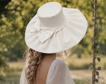 Oversized linen hat pure white wide brim country wedding statement bohemian sun race covering large bow fedora outdoor photo shoot headpiece