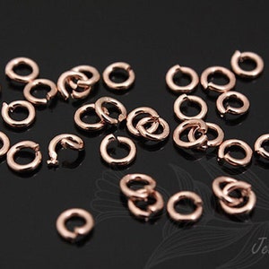 B640-0,6 x 2 mm-10g-Pierścień łączący platerowany różowym złotem-Ogniwo otwarte