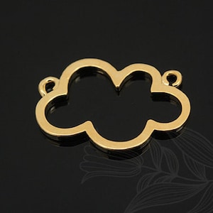 May include: A gold-coloured cloud-shaped charm with two small loops on each end. The charm has a smooth, polished surface and is set against a dark background. This jewellery component is suitable for necklaces, bracelets, and earrings.
