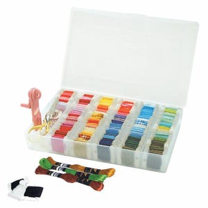 May include: A clear plastic storage box filled with colourful embroidery floss spools. The box has a lid and is open, revealing the spools. There are also three spools of floss outside the box, and a small pink tool with a key ring.