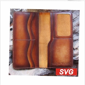 May include: Open brown leather wallet with multiple compartments. The wallet has a card slot and several pockets for cash and other items. The leather has a gradient effect, transitioning from a darker brown to a lighter tan color.