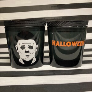 Halloween Michael Myers 6oz hand poured candle Black Oval Jar  Scented in Cedarwood Spice, Fresh apple, and Candy Corn Horror Movie